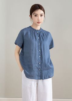 "Our blue linen shirt, loose, comfortable and versatile. It is practical enough to tuck into your favorite shirt, our blouse can also pair with skinny jeans, yes, it is a good choice for women tops.This shirt can be worn on both sides. Why Good selection with linen shirt? The main benefit of wearing linen clothes in hot weather is the coolness they provide. Linen is highly absorbent and a good conductor of heat. Your linen garment feels cool to the touch and linen fabric will quickly remove pers Casual Flax Cotton Blouse, Casual Flax-colored Cotton Blouse, Casual Linen Blouse For Casual Gatherings, Solid Ramie Tops For Spring, Casual Flax Button-up Top, Casual Flax Tops For Spring, Relaxed Fit Ramie Blouse, Casual Linen Blouse In Flax Color, Casual Flax-color Linen Blouse