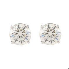 Classic diamond stud earrings, each stone EGL certified, by Alexander Beverly Hills. Two matching round brilliant diamonds 2.51 carats total. Both stones L color grade, one stone VS1 clarity grade and the other VS2 clarity grade. 18k white gold. Accommodated with an up-to-date digital appraisal by a GIA G.G. once purchased, upon request. Please contact us with any questions.  EGL Report Number  924591503 Color Grading, Diamond Stud Earrings, Diamond Stud, Diamond Earrings Studs, Round Brilliant, Beverly Hills, Alexander, Diamonds, White Gold