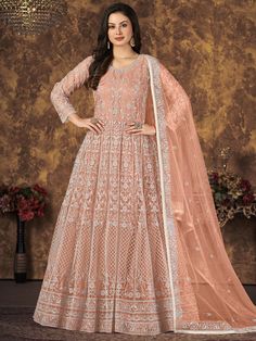 Buy orange net festive wear anarkali suit online on Inddus. This impressive anarkali gown set comes with a net dupatta and santoon bottom. Semi-stitched Net Gown For Eid, Floor-length Net Sharara For Eid, Eid Semi-stitched Net Gown, Anarkali Net Gown Floor-length, Anarkali Floor-length Net Gown, Anarkali Style Floor-length Net Gown, Anarkali Net Gown For Eid, Festive Floor-length Net Anarkali Set, Floor-length Net Salwar Kameez With Sheer Dupatta