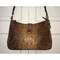 Beautiful Vintage Brahmin Shoulder Bag In Toasted Almond. Purse Is In Excellent Condition And Shows No Wear As It Was Only Carried Once Or Twice. The Strap Can Be Adjusted From Approximately 23” To 43”. Strap Is Long Enough To Be Carried As A Crossbody. Bag Has A Key Ring Clip, Two Loops To Hold Pens Or Pencils, Two Inner Pockets On Front, One Inner Pocket That Zips On Back, And One Exterior Pocket On Front Of Bag. Brahmin Bags, Key Ring, Crossbody Bag, Almond, Bag Lady, Purse, Key, Exterior, Shoulder Bag