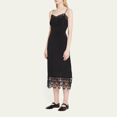 Simone Rocha slip dress with lace trim Sweetheart neckline Adjustable shoulder straps Bias-cut silhouette Midi length Slipover style Acetate/silk Dry clean, professional cleaning recommended Made in Portugal