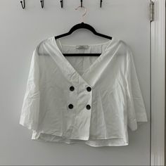 Super Cute! Never Worn Wrinkles From Being In Storage But Will Steam Before Shipping White V-neck Shirt With Buttons, White V-neck Blouse With Buttons, White Cropped Top With Buttons, Chic White Blouse With Button Closure, Chic Cropped Tops With Button Closure, Chic White Blouse With Buttons, V-neck Blouse With Buttons For Brunch, Cropped Tops With Buttons For Day Out, Chic Button Tops For Brunch