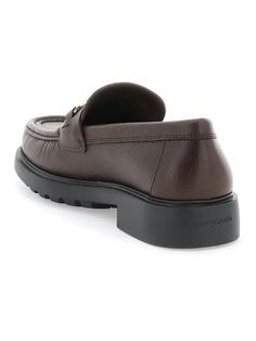 Step up your style game with these sleek and sophisticated loafers. The embossed leather and double-finish Gancini detail add a touch of luxury, while the raised stitched apron and chunky rubber sole provide a comfortable and durable fit. Perfect for those with wider feet, these loafers offer both style and comfort for any occasion. Embossed leather construction Double-finish Gancini detail Raised stitched apron Chunky rubber sole Fit: EEE Prada Designer, Balenciaga Designer, Designer Sunglasses, Leather Loafers, High Quality Leather, Watch Design, Embossed Leather, Step Up, Designer Shoes