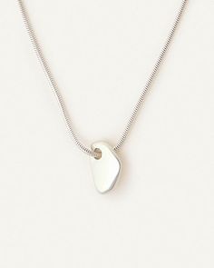 forma Modern Sterling Silver Heart Pendant Necklace, Minimalist Hand Cast Jewelry With Round Pendant, Minimalist Hand Cast Sterling Silver Necklace, Elegant Sterling Silver Necklace With Raw Stone, Modern Everyday Hand Forged Necklace, Elegant Silver Nugget Necklace, Modern Hand Forged Necklaces For Everyday, Minimalist Silver Jewelry With Raw Stone, Modern Pendant Necklace With Large Stone