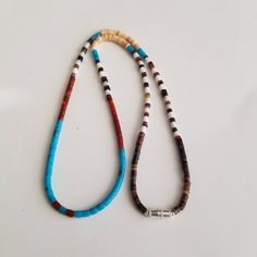 This gorgeous hand-strung with mix heishi bead, seashell necklace will look amazing with a Southwestern style. Length: 18 inches Free shipping Necklace is hand- strung by me. Thank you for looking! https://www.etsy.com/shop/lovelyturquoise Southwestern Style Heishi Beads Jewelry For Beach, Handmade Southwestern Beaded Necklaces For Beach, Beach Turquoise Heishi Beads Necklace, Southwestern Turquoise Beaded Necklaces For Beach, Bohemian Turquoise Necklace With Colorful Heishi Beads, Turquoise Southwestern Beaded Necklace For Beach, Handmade Southwestern Necklace For Beach, Southwestern Colorful Beaded Jewelry For Beach, Southwestern Style Colorful Beaded Jewelry For Beach