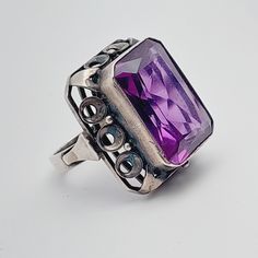 Very beautiful antique 925 silver ring with purple stone Size 19 59 Ring head 2.7cm x 2.5cm material 925 silver A beautiful antique piece of jewelry Antique Sterling Silver Ring With Large Stone, Classic Handmade Purple Rings, Handmade Classic Purple Ring, Vintage Silver Amethyst Ring With Stone Setting, Vintage Sterling Silver Amethyst Ring With Stone Setting, Classic Purple Rings Stamped 925, Vintage Sterling Silver Purple Rings, Antique Silver Amethyst Sterling Silver Ring, Vintage Purple Sterling Silver Ring