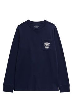 Gridiron glory awaits your young footballer in this soft cotton T-shirt sporting a familiar whale dressed for varsity victory. Chest patch pocket 100% cotton Machine wash, tumble dry Made in Peru Varsity Long Sleeve T-shirt For School, Collegiate Navy Cotton Top, Navy Long Sleeve Collegiate Top, Navy Cotton Top For College, Navy Cotton Tops For College, Navy Varsity Top For College, Casual Navy T-shirt With Team Name, Navy Collegiate Top For College, Navy Collegiate Style Top