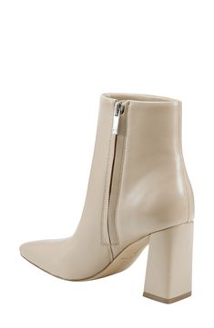 Boasting a clean-lined, sleek silhouette with a modern square toe and tapered block heel, this versatile leather bootie is a go-to cool-weather look. 3 1/2" heel(size 8.5) 4 3/4" shaft Leather upper/synthetic lining and sole Imported Modern Ankle Heeled Boots With Branded Heel Counter, Modern Heeled Boots With Contrasting Heel Counter, Modern Square Toe Boots With Contrasting Heel, Modern Heeled Boots With Stacked Heel, Chic Square Toe Boots With Heel Tab, Modern Heeled Boots With Padded Heel For Spring, Modern Padded Heel Boots For Spring, Sleek Heeled Boots With Sculpted Heel For Spring, Sleek Spring Heeled Boots With Sculpted Heel