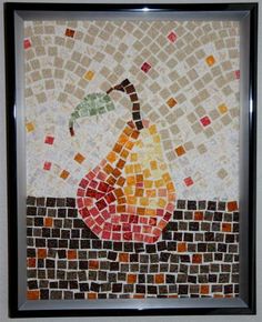 a mosaic art piece with an orange and yellow pear on it's side, in a black frame