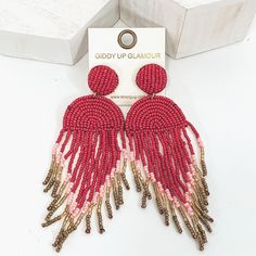 These are a gorgeous statement earrings to pair with some gold heels! These drop earrings are perfect when you feel your outfit is a little dull! These earrings are about 4.5 inches long and 1.5 inches wide. SKU: #0908-2156 Earrings With Tassels, Giddy Up Glamour, Drop Beads, Gold Heels, Beaded Earrings, Statement Earrings, Dream Catcher, Crochet Earrings, Tassels