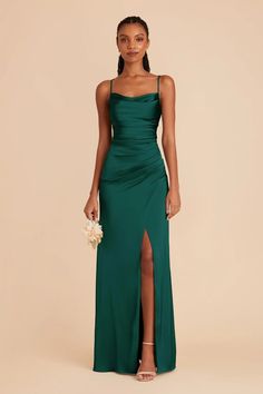 A modern mermaid skirt and cool cowl neck join forces to bring you Lydia: a showstopping bridesmaid dress for a glamorous wedding.

Cowl neck matte satin gown with spaghetti straps
Fully lined mermaid skirt with overlapping slit design
Zipper closure
No bra cups
100% polyester shell and lining
Dry clean only Cowl Neck Bridesmaid Dress, Emerald Bridesmaid Dress, Emerald Bridesmaid, Modern Mermaid, Prom Dress Inspo, Emerald Bridesmaid Dresses, Emerald Dresses, Birdy Grey, Emerald Green Dresses