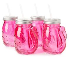 four pink mason jars with straws in them