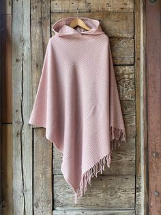 Soft pink wool blanket poncho cape Powder pink lambswool/bamboo mix long poncho cape Large size Ladies poncho natural wool/bamboo mix poncho One size fits fashionably for most everyone, short or tall, big or small. This piece is versatile for both Men's & Women's outdoor fashion, and can be used insider in cooler winter weather to keep warm while reading on the couch. CARE: Hand-wash and hang to dry, light iron if needed, or dry clean. MEASURES: Length at the front of the neckline to the bottom Pink Shawl For Fall, Pink Shawl Poncho For Winter, One Size Pink Shawl For Winter, Pink One Size Shawl For Winter, Pink One-size Winter Shawl, Pink One-size Poncho For Fall, Pink One Size Poncho For Fall, Cozy Pink One Size Poncho, Cozy Pink Poncho For Fall