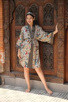 The perfect gift for anyone who loves the finer moments in life, this soft and sexy kimono robe is crafted by hand with strong attention to detail. With a gorgeous print and exclusive stitches, it's perfect for an extended variety of use. Crafted by hand with strong attention to detail which boasts the finest rayon fabric. Rayon is a versatile fabric made from purified cellulose fibers, known to take on the properties of silk.Lightweight and delicate, rayon feels like a smooth breeze on your ski Multicolor Wrap Robe For Loungewear, Long Kimono For Home, Multicolor Printed Robe For Loungewear, Open Front Kimono For Sleep, Floral Print Long Sleeve Sleep Kimono, Printed Sleepwear With Kimono Sleeves For Loungewear, Long Printed Robe For Loungewear, Long Printed Kimono For Loungewear, Bohemian Printed Kimono