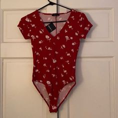 Forever21 Nwt Dark Red Floral Ribbed Body Suit Size Small. Red Fitted V-neck Bodysuit, Fitted Red V-neck Bodysuit, Spring Red V-neck Bodysuit, Red V-neck Bodysuit For Spring, Fitted Red Summer Bodysuit, Fitted V-neck Floral Print Bodysuit, Trendy Fitted Red Bodysuit, Red Casual Bodysuit For Spring, Casual Red Bodysuit For Spring