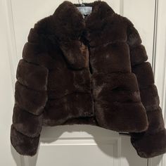 Luxe Jenny Faux Fox Fur Short Coat In Brown Never Worn! Long Sleeve Mink Outerwear With Faux Fur Lining, Faux Fur Long Sleeve Mink Outerwear, Mink-colored Long Sleeve Faux Fur Outerwear, Mink Color Long Sleeve Faux Fur Outerwear, Brown Faux Fur Lined Outerwear, Chic Brown Faux Fur Coat, Chic Brown Fur Coat With Faux Fur Lining, Chic Fitted Fluffy Outerwear, Chic Mink Outerwear With Faux Fur Lining