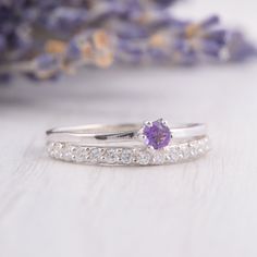 Womens Amethyst Ring, Silver Amethyst Ring, Amethyst Promise Ring, Silver Promise Ring for Her, Unique Amethyst Ring, Dainty Promise Ring WE OFFER UNLIMITED PERIOD INSTALLMENTS PLAN This is a beautiful, stunning, feminine ring that works well for all occasions, styles, and ages. You will love it! Ring information: Main stone: Amethyst Approximate size: 3.0mm Accents stones: White cubic zirconia Approximate size: 1.5mm (16 stones) Metal type: Silver Metal stamp: 925 Sterling Silver Installment Pa Purple Amethyst Stackable Wedding Rings, Purple Birthstone Stackable Rings For Wedding, Amethyst Solitaire Ring For Promise, Stackable Amethyst Birthstone Promise Ring, Purple Amethyst Diamond Ring For Promise, Amethyst Promise Ring Birthstone, Purple Amethyst Ring With Center Stone And Round Band, Lavender Amethyst Ring With Accent Stones For Promise, Purple Amethyst Birthstone Ring With Round Band