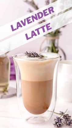 lavender latte in a glass cup with lavender sprigs on the side and text overlay that reads lavender latte