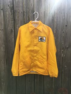 This is a great jacket for anyone that is ready to look and feel incredible. It is in great condition and has no rips, holes or smells. There is some small staining, pictured. Measurements: Pit to pit: 20 1/2 inches Collar to bottom front: 23 3/4 inches Collar to bottom back: 27 3/4 inches Sleeve Length (from collar): 30 inches Size on tag: Small Nike Jacket, Vintage 70s, Button Up, Athletic Jacket, Sleeve Length, The Incredibles, Long Sleeve