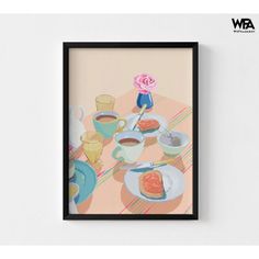 a painting hanging on the wall next to a cup of coffee and plate with food