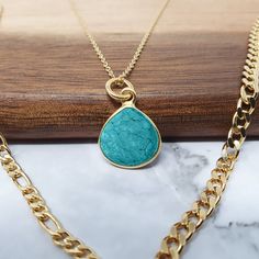 "December Birthstone Necklace |Tibetan Turquoise Necklace | Birthday Gift | Raw Turquoise Necklace | Healing Crystal | Natural Turquoise The semi-precious Tibetan turquoise gem necklace dazzles with its stunning blue green hues and simple elegance. The vibrant pear-cut Tibetan turquoise gem has been bezel set onto 18k Gold Vermeil so that it may keep its shine for a long time. This piece was made using gold vermeil (pronounced vehr-may) is a technique where by a thick layer of gold is used to cr Bohemian Teardrop Turquoise Necklace As Gift, Bohemian Turquoise Teardrop Pendant Necklace For Gift, December Birthstone Necklace, Turquoise Gem, Raw Turquoise, Tibetan Turquoise, Gem Necklace, Luxury Necklace, Birthstone Pendant