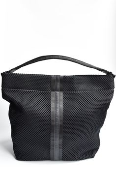 Beautifully layered materials come together to create the perfect hobo bag. Black mesh, webbing and our signature leather is highlighted by a high gloss liner. Large enough for all your essentials, with a little bit of edge. Carry the bag by the sporty handle or on the shoulder with the padded strap. Content:- Mesh- Leather- Imported Size:- Width: 19.75"- Height: 16.25"- Depth: 7"- Handle Drop: 12"