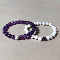 Distance Bracelets Set - Purple Amethyst & White Howlite Matching Pair - Long Distance - Friendships /relationships /couples - Gift of Beads Product details: Bracelet type: bead Material: Amethyst & Howlite  Color: Purple & White  Band type: Elastic Dimensions: Bead size: 8mm Bracelet length: 7Inches (Elastic design made to fit wrists of all sizes! One size fits all.) Weight: 17 gm (Approx.) each 1. Choose between ordering a set or single bracelets above! This allows you to send the different co Bsf Matching Bracelets, White Stackable Beaded Bracelets For Healing, White Beaded Amethyst Jewelry, White Amethyst Jewelry With 8mm Beads, White Amethyst Beaded Bracelets For Spiritual Style, White Amethyst Beaded Bracelets As Gift, White Amethyst Beaded Bracelet As Gift, White Amethyst Beaded Bracelets, White Amethyst Spiritual Beaded Bracelets