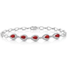 Shop the Ruby and Diamond Vintage Bracelet (7.5 in) from Shane Co. Enjoy free 2-day shipping and returns on all orders. Vintage Bracelet, Natural Ruby, Vintage Bracelets, Vintage Diamond, Pear Shaped, Bracelet Set, Lobster Clasp, Diamond Bracelet, Round Diamonds