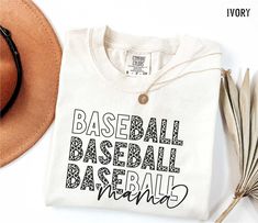 a t - shirt that says baseball, baseball barbeque on it next to a hat