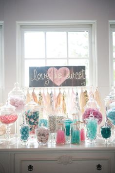 candy bar with love is sweet sign and lots of lollipops