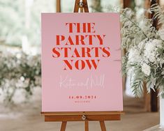 an easel with a sign that says the party starts now