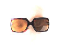 "Classy vintage 90s, dark brown tortoise, rectangular, curved shape with a dark brown lenses sunglasses. Made in France. Simple and stylish. Gently used condition. Clean and strong. No discoloration, no brocked parts. There only a tiny scratch at the frame neer by right lense. But it's not visible and don't effected a value. Measures: Length fron the arm to the arm at the middle: Length of the bridge: 0,5\" Size of the lenses: 2,0\" x 1,1\"x 1,75\" Length of the arms: 5,5\" Thank you for stoppin Vintage Square Sunglasses With Tinted Lenses, Retro Brown Sunglasses For Formal Occasion, Brown Retro Sunglasses For Formal Occasions, Retro Brown Formal Sunglasses, Brown Retro Formal Sunglasses, Brown Square Sunglasses With Tinted Lenses, Vintage Brown Rectangular Sunglasses, Vintage Tortoiseshell Rectangular Sunglasses, Rainy Winter