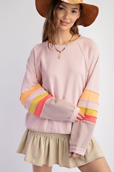 If you're looking for the perfect addition to your wardrobe, you'll love the Easel Loose Fit Terry Knit Top! With its color blocked detailing and raw edging at the sleeves, you'll be sure to stand out! Plus, you'll feel comfy and cozy all day long in the boxy, loose fit of the Easel pullover talk about an easy win! Material and Care 100% Cotton Hand Wash Cold Hang to Dry Measurements Small Bust:48" Length:25.5 ” Sleeve Length:28.5” Medium Bust: 50” Length:26 ” Sleeve Length:29” Large Bust: 52 ” Pink Spliced Top For Fall, Pink Long Sleeve Sweater With Contrast Color, Pink Color Block Cotton Sweater, Spring Pink Sweater With Contrast Color, Pink Contrast Color Sweater For Spring, Pink Contrast Color Spring Sweater, Spring Pink Contrast Color Sweater, Pink Crew Neck Sweater With Contrast Color, Pink Contrast Color Crew Neck Sweater