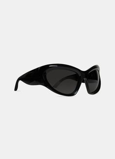 D-frame sunglasses by Balenciaga in bio injected nylon with grey lenses featuring engraved logo. Lens category: 3. One size fits all, standard fit. Dimensions: Arm length = 11,43 cm. Nose bridge = 1,78 cm. 100% UVA and UVB protection. Made in Italy. Not suitable for optical conversion. Hand Makeup, Balenciaga Sunglasses, Wrap Sunglasses, Balenciaga Black, Sneaker Jewelry, Engraved Logo, Nose Bridge, Black Sunglasses, Grey Lenses