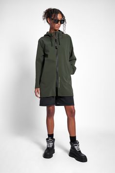 Stockholm Lightweight Matte Zip Raincoat Green | STUTTERHEIM US Sporty Waterproof Hooded Parka, Sporty Hooded Waterproof Parka, Sporty Parka For Rainy Weather With Pockets, Sporty Hooded Parka For Rainy Weather, Modern Long Sleeve Raincoat For Outdoor, Weatherproof Hooded Athleisure Outerwear, Weatherproof Hooded Outerwear In Athleisure Style, Weatherproof Hooded Outerwear For Athleisure, Sporty Waterproof Parka For Rainy Weather