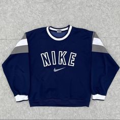 Amazing Condition Vintage Piece Bought For Myself But Was Too Small This Fits Like A Medium Imo Tag Marked Large Blue Embroidered Tops For Streetwear, Sporty Blue Embroidered Sweatshirt, Vintage Nike Clothes, Inspo Fits, Vintage Nike Sweatshirt, Academia Outfits, Nike Crewneck, Nike Sweatshirt, Embroidered Crewneck