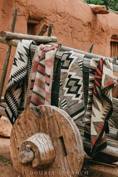 Traditional blankets, blanket patterns, and Navajo weavings have an indelible role in the Double D Ranch story. They inspired the original blanket coats for which we became known and launched us on this journey, and they’ve consistently provided aesthetic inspiration throughout decades of design. We hold a reverence for weaving as an artform and we are beyond excited to share these cherished pieces with y’all online and in the Fort Worth flagship store. affiliation: Navajo materials: wool vintage condition no holes or tears wear to edges overall wear commensurate to age style: HT146 in stock All returns on jewelry are subject to exchange or store credit only Native American Textiles, Navajo Pillows, Navajo Aesthetic, Southwest Aesthetic, Blanket Coats, Navajo Weaving, Double D Ranch, Navajo Rugs, Blanket Coat