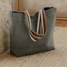 The Quinn Collection is designed to transition with you from season to season. The soft denim shade will add a pop of interest to any neutral outfit. Available in shouldersac, crossbody, and pouch.Material: 100% linen - washed finish Dimensions: 36"x38"x15" Shipping: Items in stock will ship within 2-3 business days. Please see our Shipping terms for more information. Everyday Linen Shoulder Bag With Pockets, Linen Shoulder Bag With Pockets For Everyday Use, Linen Tote Shoulder Bag, Everyday Linen Shoulder Bag With Leather Handles, Everyday Linen Canvas Bag With Leather Handles, Casual Linen Bag For Everyday Use, Linen Shoulder Bag With Leather Handles For Everyday Use, Casual Everyday Linen Canvas Bag, Casual Linen Canvas Bag For Everyday