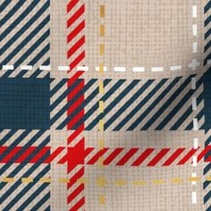 the fabric is made up of different colors and patterns, including red, white, blue, and yellow