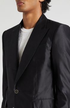 The brand's slim Sicilia fit shows off the silk-shantung construction to its fullest richness of texture and sheen on this Italian-tailored two-piece suit. Jacket has peaked lapels; four-button cuffs; chest welt pocket; front flap pockets; two interior pockets; back vent Pants have zip fly with hook-and-bar closure; front slant pockets; coin welt pocket; back button-welt pockets Jacket is lined; trousers are lined to the knee 100% silk Dry clean Made in Italy Men's Designer Clothing Luxury Black Satin Suit, Sleek Satin Blazer For Business, Tailored Satin Suits For Semi-formal Occasions, Tailored Satin Suit For Semi-formal Occasions, Luxury Satin Blazer For Business, Tailored Satin Semi-formal Suits, Tailored Satin Tuxedo With Notch Lapel, Classic Formal Satin Blazer, Classic Satin Formal Blazer