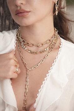 The Margaux Lariat is made from our U link chain, fastened with a with a custom U link Clasp. Material: Brass Plating: 10K Gold or Rhodium-Silver. Chain has a clear protective coating to prevent from quick wear and tarnishing. 4 Length Options: 16" with a 6" drop, 18” with a 5” drop, 24" with a 6" drop or 30" with a 6" drop U Links measure: 16mm Long x 7mm wide x 1.8mm thick Clasp Measures: 20mm Our jewelry is always handmade from sustainable materials in the USA. Brass Jewelry, Jewelry Cleaner, Lariat Necklace, Sustainable Materials, Heart Pendant Necklace, 10k Gold, Link Chain, Heart Pendant, Ring Earrings