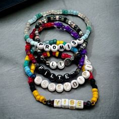 Beaded bracelets based on solo songs by Jimin of BTS. Mix and Match to create your perfect combination. Featuring Promise, Serendipity, Lie, Filter, and Vibe.  Closer Than This bracelets available here https://meekostreasures.etsy.com/listing/1640773945/closer-than-this-jimin-bts-beaded Face album bracelets available here https://meekostreasures.etsy.com/listing/1548785590/face-jimin-album-themed-beaded-bracelets Please keep in mind that colors may appear different due to individual screen setti Multicolor Round Beads Kpop Jewelry, Kpop Style Friendship Bracelets With Round Beads, Multicolor Kpop Jewelry For Friendship, Kpop Style Beaded Bracelets As Gift, Kpop Style Letter Beads Jewelry, Album Bracelets, Bts Accessories, Bts Jimin, Friendship Bracelets