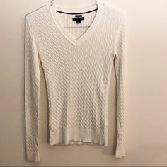 Tommy Hilfiger Cable Knit V Neck Pima Cotton Sweater Nwot 100% Pima Cotton Long Sleeve Ribbed Cuffs And Hem Hilfiger Logo On Sleeve V Neck Vibrant White Fitted Approximate Measurements: Length 22.5” Shoulder 15” Chest 12.5” Poshmark Clothes, Knit V Neck, Cotton Sweater, Pima Cotton, Cable Knit, Tommy Hilfiger, Sweaters For Women, Cable, V Neck