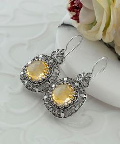 Citrine Silver Victorian Statement Drop Earrings, 925 Sterling Gemstone Artisan Handcrafted Filigree Ornate Jewelry Handcrafted Earrings,Handmade Earrings, Birthday gift, Anniversary gift, heart detail earring, square earrings -The stone used in this jewelry, Citrine Gemstone, is the November Birthstone. Material: 925 Sterling Silver ( NICKEL FREE ) Length and Width: 4cm X 2cm // 1.6 Inches X 0.8 Inches Gemstone: Citrine 12mm. Matching Bracelet; www.etsy.com/listing/1383975300 Matching Pendant; Yellow Earrings With Intricate Design For Gift, Ornate Sterling Silver Gemstone Earrings, Ornate Gemstone Earrings In Sterling Silver, Ornate Gemstone Earrings For Formal Occasions, Exquisite Filigree Earrings For Gift, Ornate Gemstone Earrings For Wedding, Yellow Filigree Jewelry, Exquisite Handmade Silver Earrings, Filigree Oval Earrings As Gift