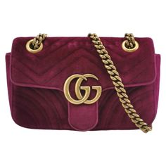 Gucci Marmont Mini Flap Pink Velvet Handbag These are professional photos of the actual bag offered by Luxbags. The Gucci Marmont Mini Flap Pink Velvet Crossbody Bag is a timeless and adaptable accessory designed by the renowned brand Gucci. Its signature V-shaped chevron stitching and prominent GG logo hardware on the flap opening make it instantly recognizable. The gold-tone chain and leather strap add a touch of luxury and convenience. From day to night, this handbag will serve as a staple in your wardrobe. CONDITION: GOOD This preloved authentic handbag is in good condition with moderate signs of wear. Rubbing on the corners and edges. Light tarnishing of the hardware. DETAILS Gucci Marmont Material: Velvet Color: Pink Size: Mini Width 21.5cm x Height 14cm x Depth 6cm Weight 530g Bag Wishlist, Gucci Marmont Mini, Velvet Handbag, Chevron Stitch, Gucci Purse, Professional Photos, Gucci Marmont, Gg Logo, Velvet Color