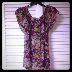 New With Tags Removed. Sheer Easy Fit, Top Stitch Detail With Optional Tie Closure. Cap Sleeve. High Point Shoulder Length 27 Inches. Vintage Purple Top For Spring, Chic Purple Floral Print Blouse, Spring Purple Floral Print Blouse, Purple Short Sleeve Spring Blouse, Summer Floral Print Purple Blouse, Summer Purple Floral Print Blouse, Purple Short Sleeve Blouse For Spring, Fitted Purple Floral Print Blouse, Vintage Purple Top With Floral Print