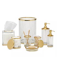 bathroom accessories including soap dispenser, toothbrush holder and toiletries