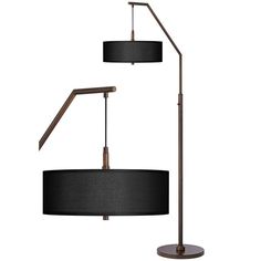 71 1/2" high overall. Shade is 16" wide x 5 1/2" high. Uses two maximum 100 watt standard-medium base bulbs (not included). 4-position stem switch on the column: right bulb on, left bulb on, both on, both off. A modern arc floor lamp. Ideal for seating conversation areas. From the Possini Euro Design brand. Hand-crafted and made-to-order black textured faux silk shade, with an acrylic diffuser at the bottom. Bronze finish base and column. Metal construction. 8-foot long cord.  This floor lamp's contemporary good looks are matched by its practical design. The custom-made black textured faux silk lamp shade is hand-assembled by artisans in California, and features a plastic diffuser at the bottom to prevent glare. The base comes in a sleek bronze finish. A modern look from the Possini Euro D Picture Wall Living Room, Modern Arc Floor Lamp, Reading Space, Floor Lamp Styles, Silk Lampshade, Arc Floor Lamp, Bronze Lamp, Arc Lamp, Adjustable Floor Lamp