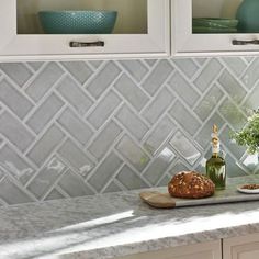 the kitchen counter is clean and ready to be used for cooking or baking, as well as some bread