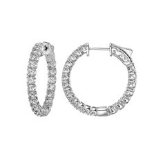 These cubic zirconia hoop earrings are a dazzling complement to your wardrobe. These cubic zirconia hoop earrings are a dazzling complement to your wardrobe. Metal: sterling silver Backings: click-it Packaging: boxed Plating: rhodium Finish: polished Diameter: 19 mm, 24.48 mmSTONE DETAILS Stone type: cubic zirconia Total weight: 4 ct., 3 1/5 ct. Shape: round Setting: prong Gemstones may have been treated to enhance their appearance. Special care may be required. Please visit our Gemstone Treatme Cubic Zirconia Hoop Earrings, Inside Outside, Cubic Zirconia, Hoop Earrings, Plating, Packaging, Engagement Rings, Gemstones, Sterling Silver